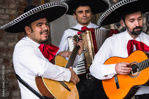 Mexican musicians in the studio, in the interior. Mexico, mariachi, artist, guitarist. 