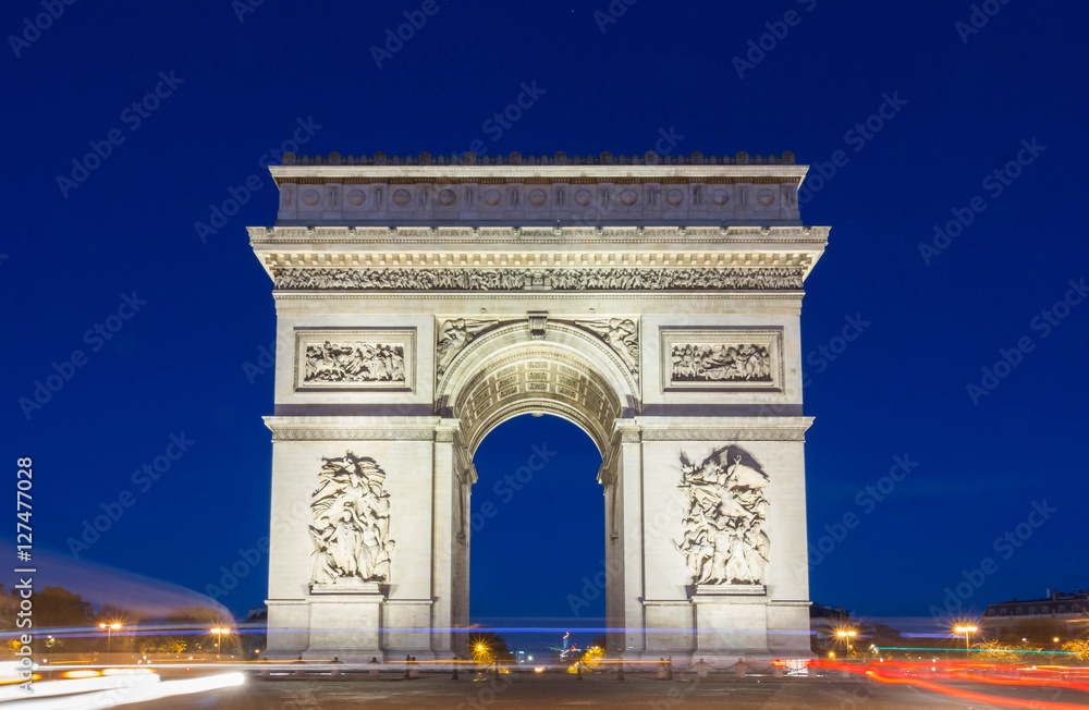 The Triumphal Arch and Champs Elysees venue at night, Paris, Fra