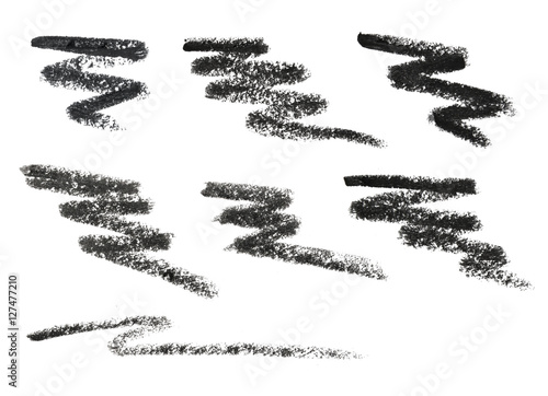 Black eye liner pencil. Cosmetic pencil and stroke isolated on white