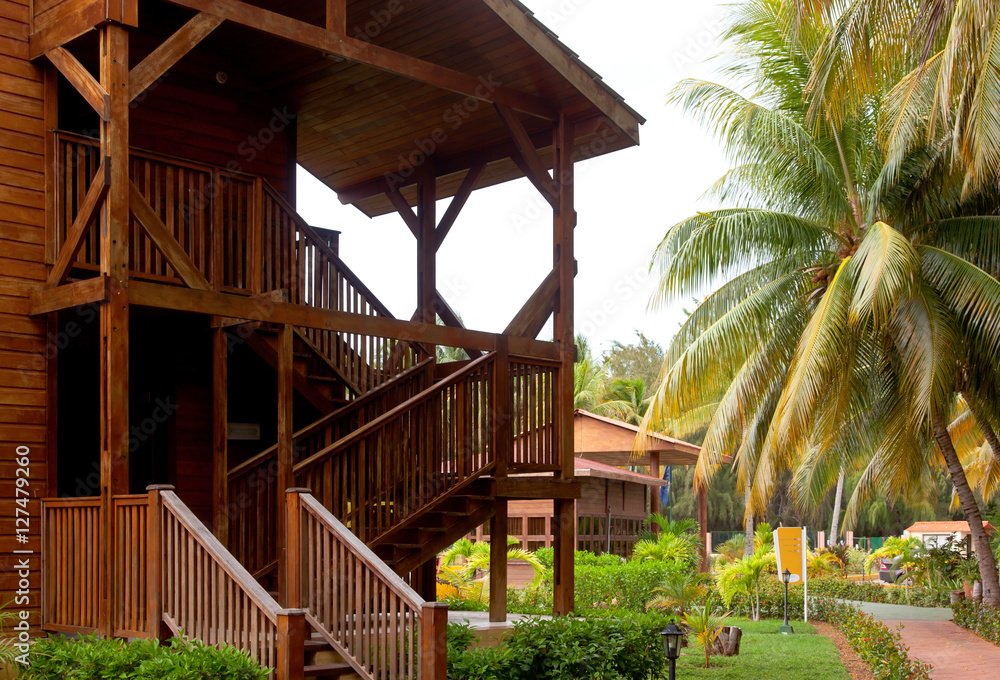 Wooden cozy comfortable bungalow houses stairs standing near the Wooden cozy comfortable bungalow houses stairs standing near the
