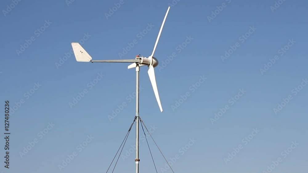 Row of wind power generator over blue sky Row of wind power generator over blue sky