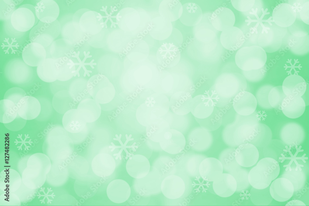 Snowflakes and bokeh light on green background Snowflakes and bokeh light on green background