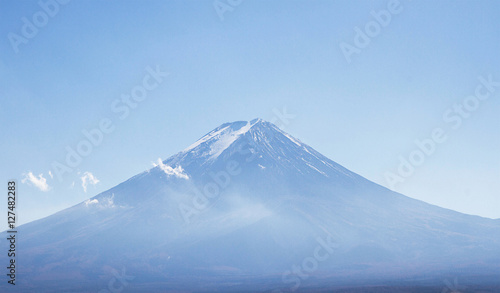 Volcano fuji ice-covered and mist morning in japan