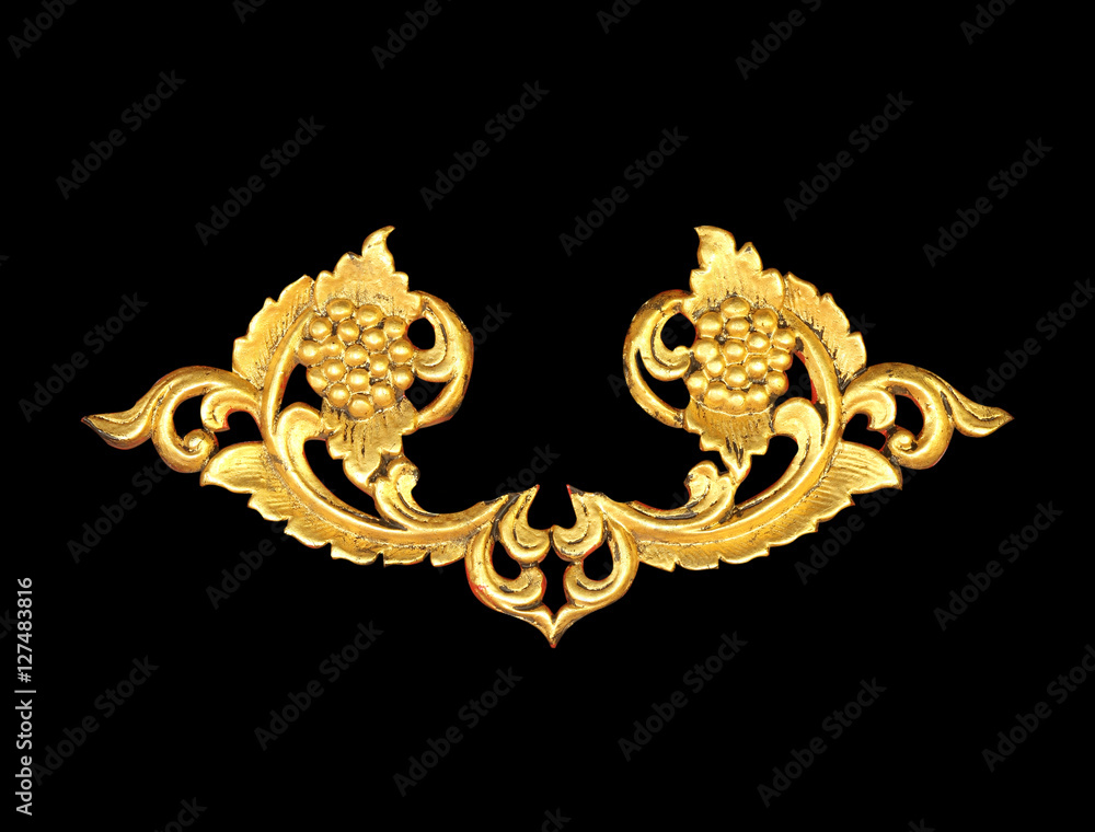 Pattern of wood carve gold paint for decoration on black backgro Pattern of wood carve gold paint for decoration on black backgro