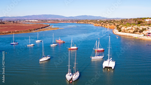 Aerial from boats in the harbor from Alvor in the Algarve Portug photo