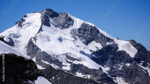Piz Bernina and the famous Bianco Ridge in the Swiss Alps