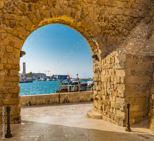 Obraz na plátně walls of the harbor of old town in Italy