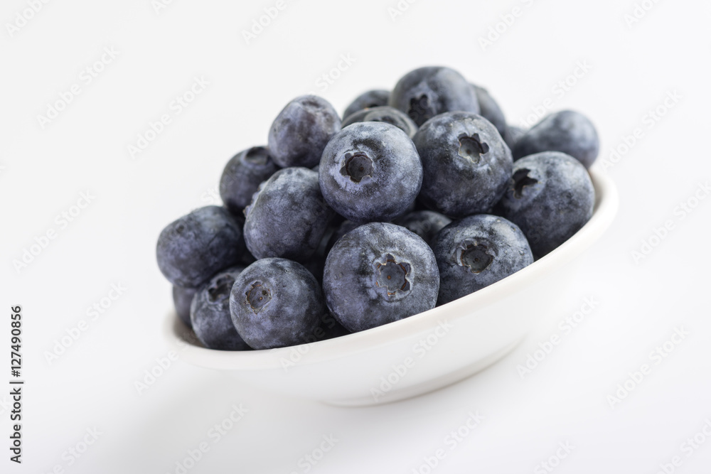 Group of fresh juicy blueberries on white background Group of fresh juicy blueberries on white background