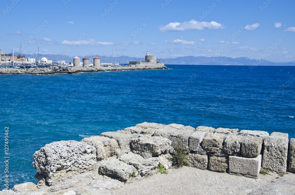 Sea landscape in Rhodes  with port and fort, Greece