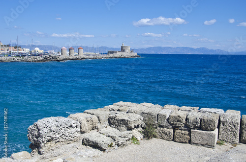 Fototapeta Naklejka Na Ścianę i Meble -  Sea landscape in Rhodes  with port and fort, Greece