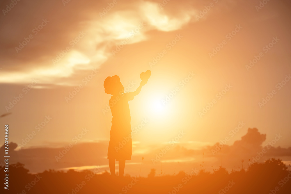 kid silhouette,Moments of the child's joy. On the Nature sunset kid silhouette,Moments of the child's joy. On the Nature sunset