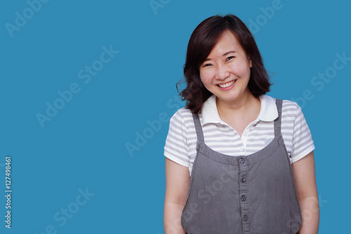 Photography Asian woman smiling portrait, with confident and happiness, isolated over the cy