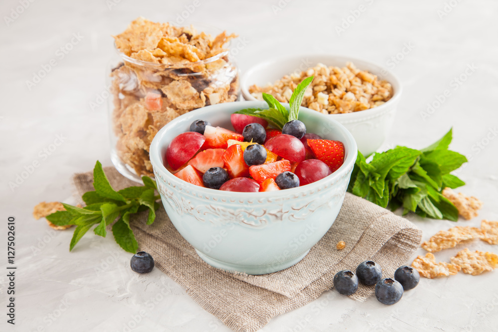 muesli with berries in a bowl on a table, selective focus muesli with berries in a bowl on a table, selective focus