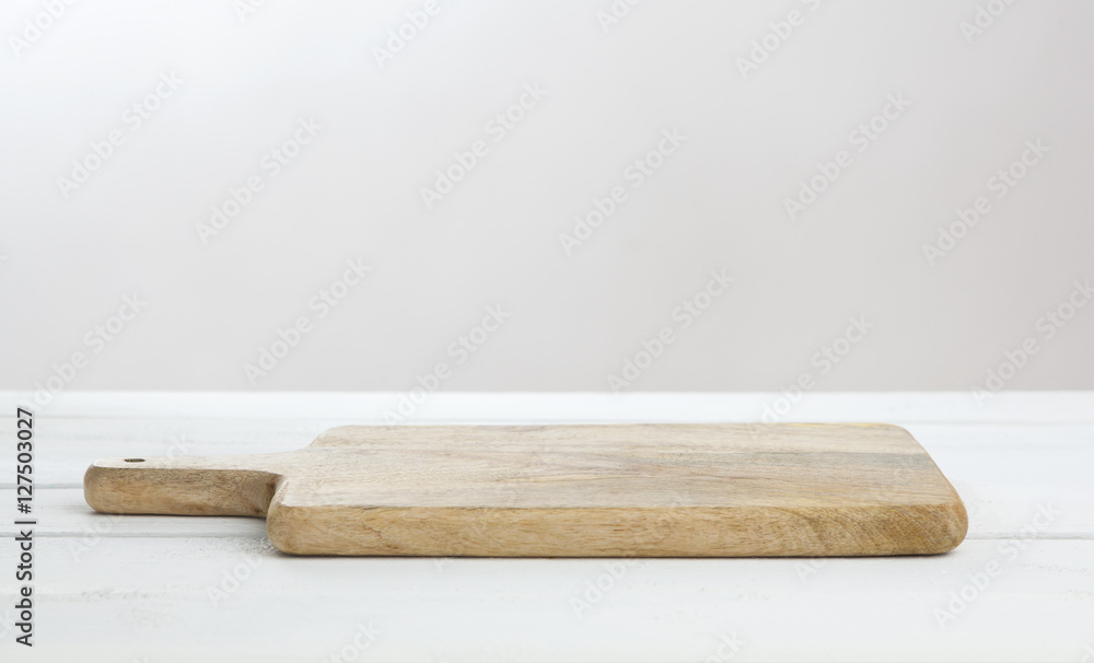 Empty white table with cutting board, product display montage Empty white table with cutting board, product display montage
