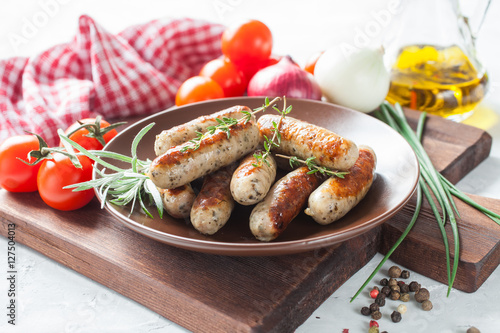 sausages and vegetables on a table, selective focus