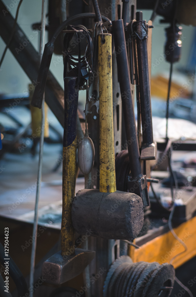 Work tools hanged in a workshop