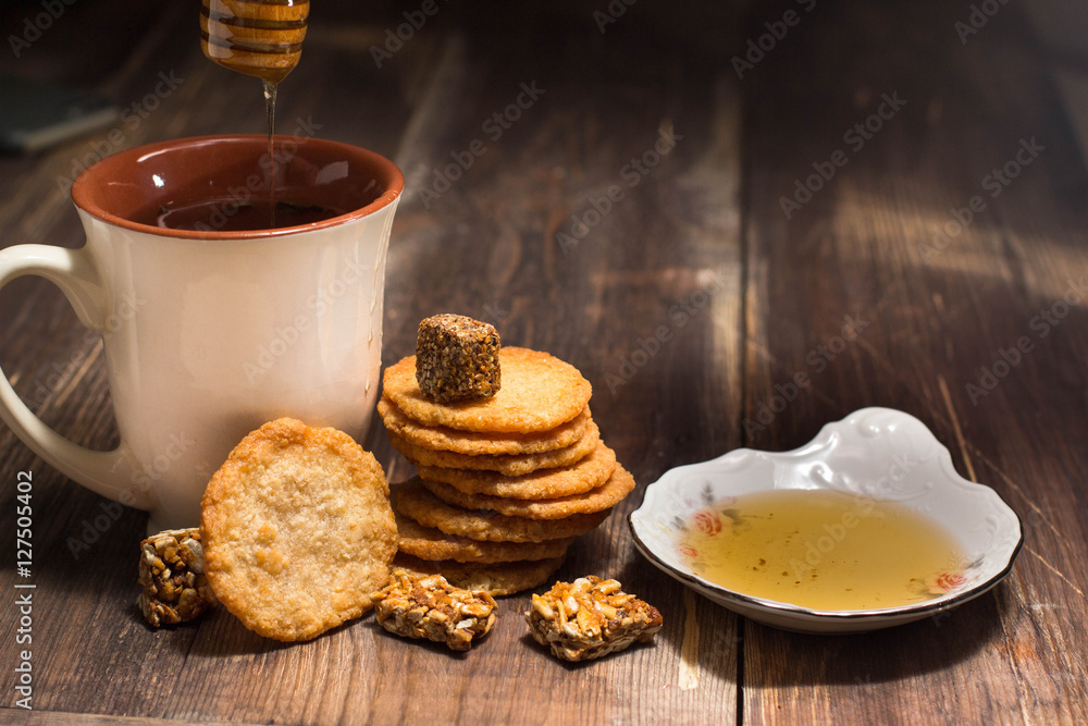 herbal hot tea, cookies, honey and sweets herbal hot tea, cookies, honey and sweets