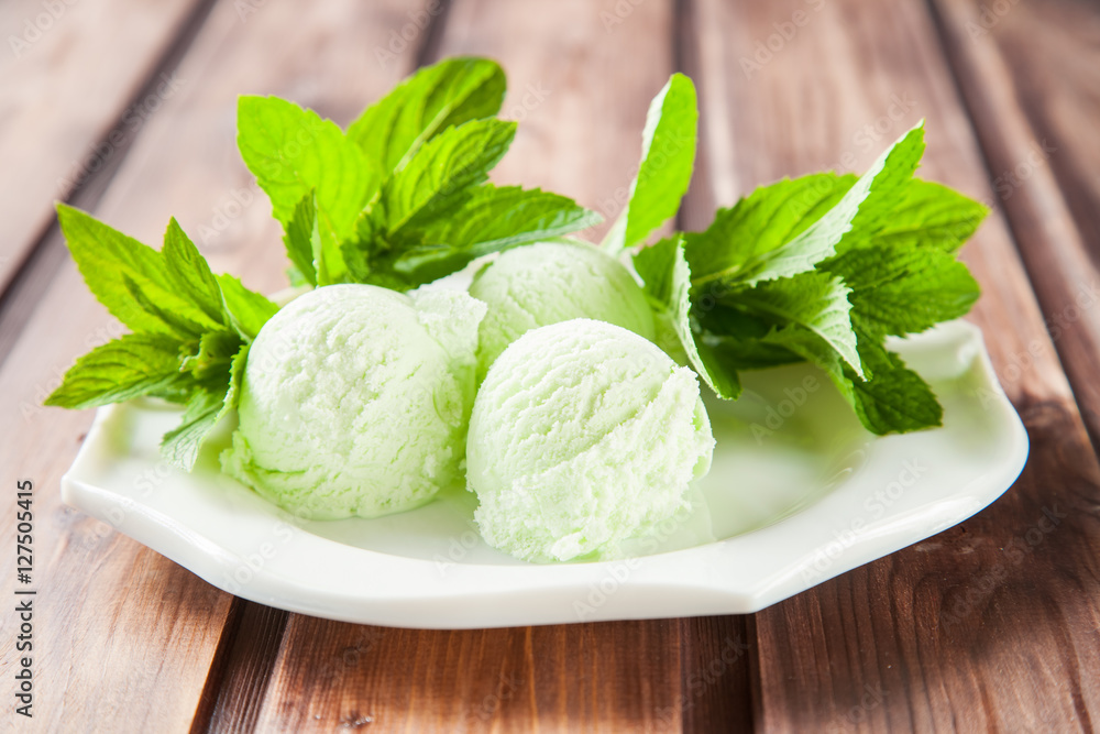 mint ice cream in a plate on a table, selective focus mint ice cream in a plate on a table, selective focus