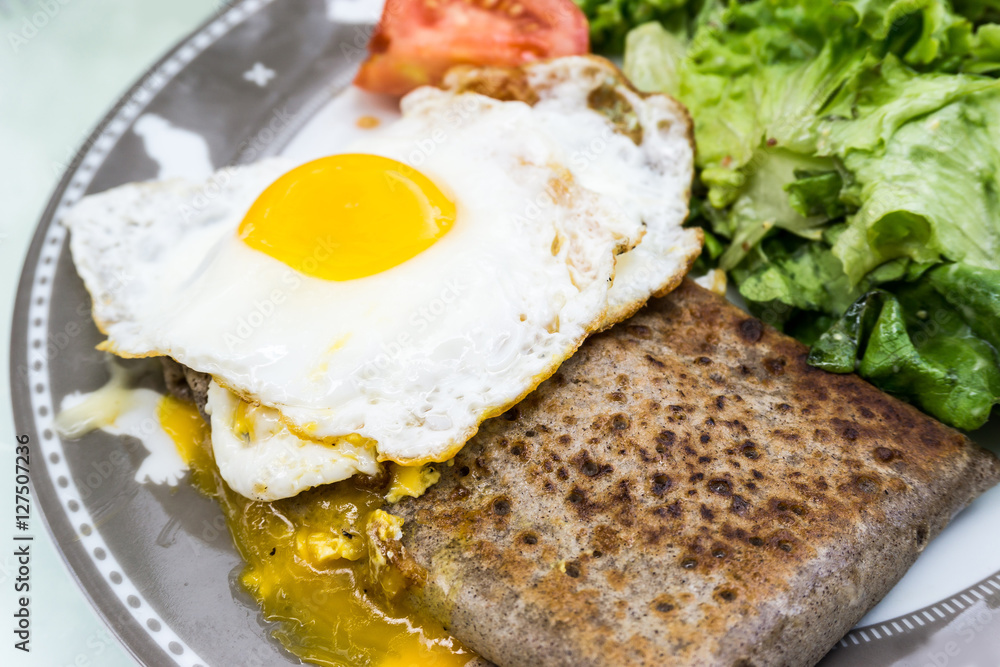 Homemade french buckwheat galette with egg Homemade french buckwheat galette with egg