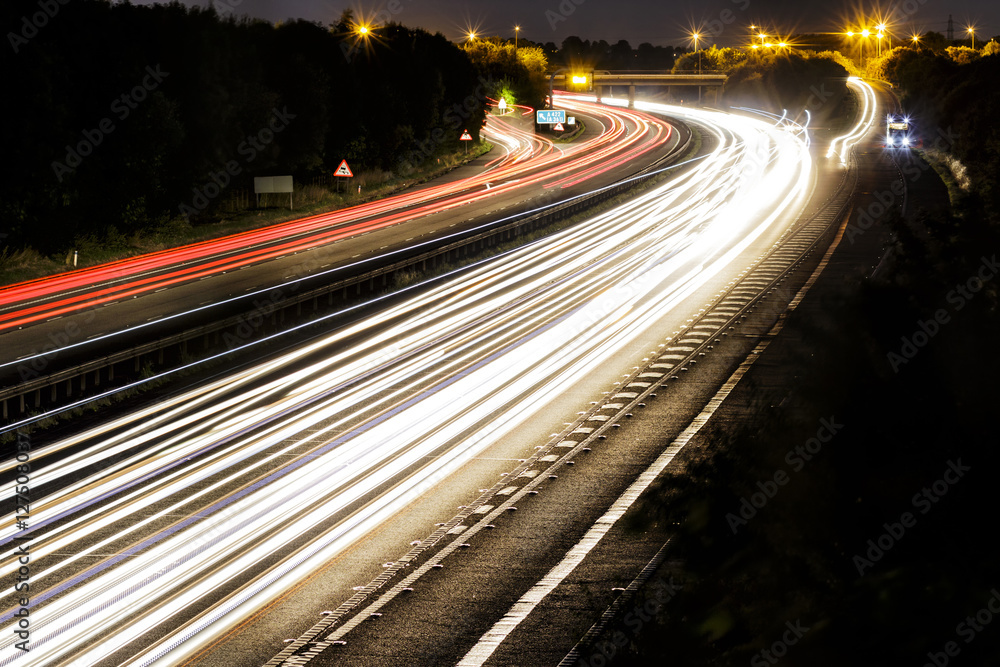 Car lights on a highway at night Car lights on a highway at night