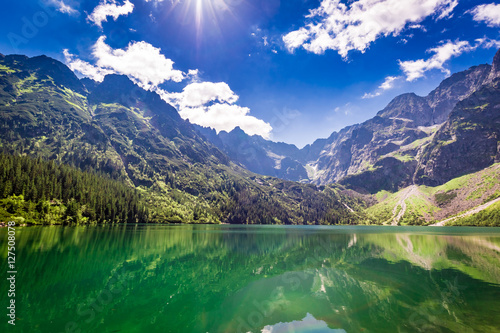 Fototapeta Naklejka Na Ścianę i Meble -  Stunning pond in the mountains at sunrise in Poland