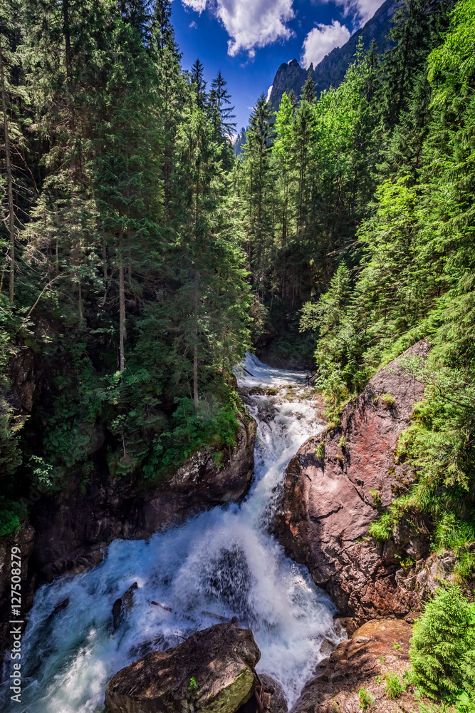 Naklejka premium Waterfall Wodogrzmoty Mickiewicza in the Tatras in Poland
