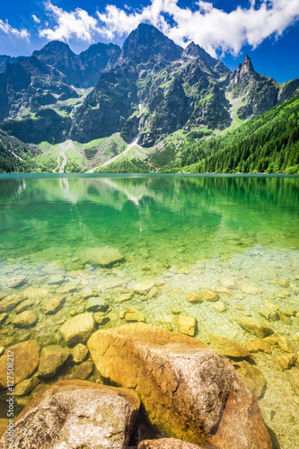 Fototapeta Naklejka Na Ścianę i Meble -  Stunning lake in the mountains at dawn in summer