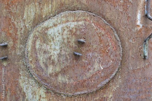 Old metal surface with welded hatch