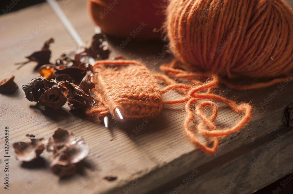 Orange woolen thread with knitted scarf Orange woolen thread with knitted scarf