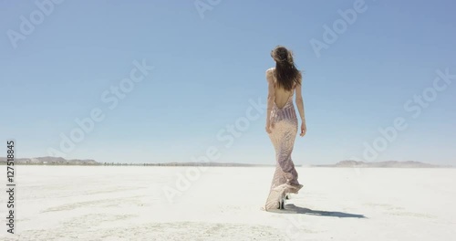Girl walking in the desert