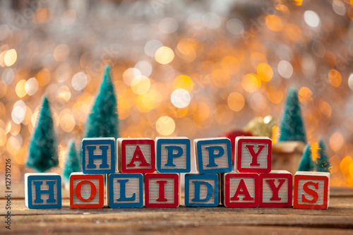 Happy Holidays Written With Toy Blocks On Christmas Card Backgro