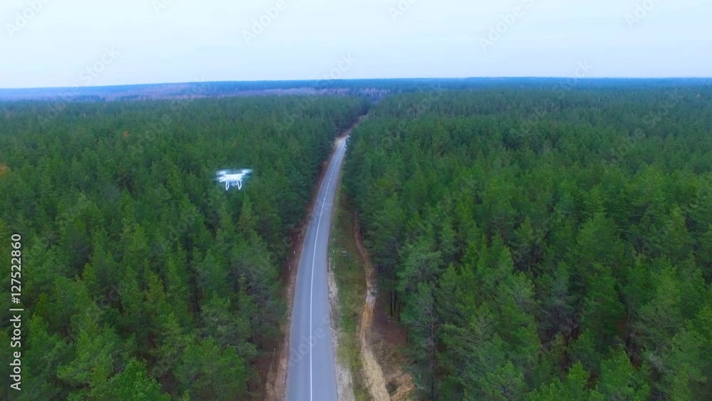 Drone, copter flying over forest monitoring area. 4K Drone, copter flying over forest monitoring area. 4K