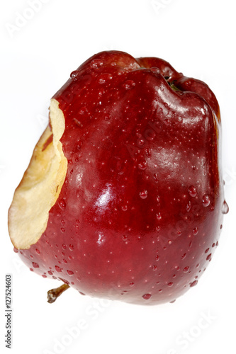 bitten red apple isolated on white background