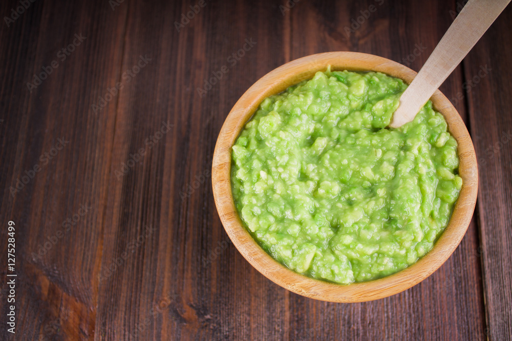 avocado Guacamole on molcajete real Mexican traditional procedur