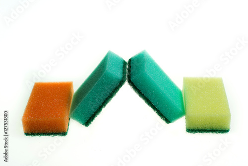 Sponges for washing close-up on the table. Fight with dirt. Cannon Housewives.