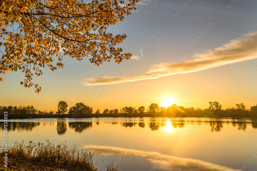 Romantic Autumn sunset on the lake