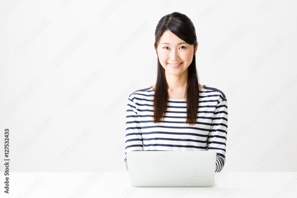 young asian woman using laptop isolated on white background young asian woman using laptop isolated on white background