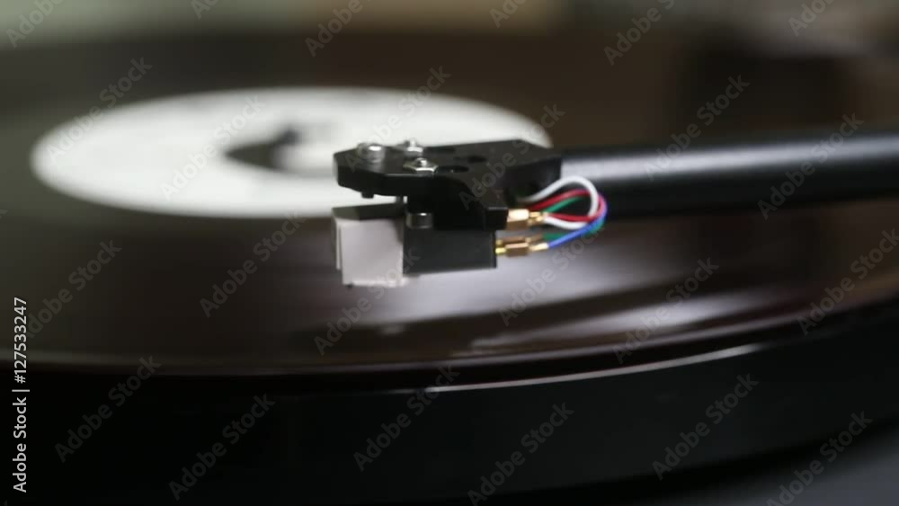 Record player spinning in slow motion with needle dropping Stock Video