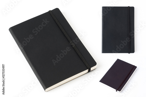 Black leather notebook isolated on white background. photo