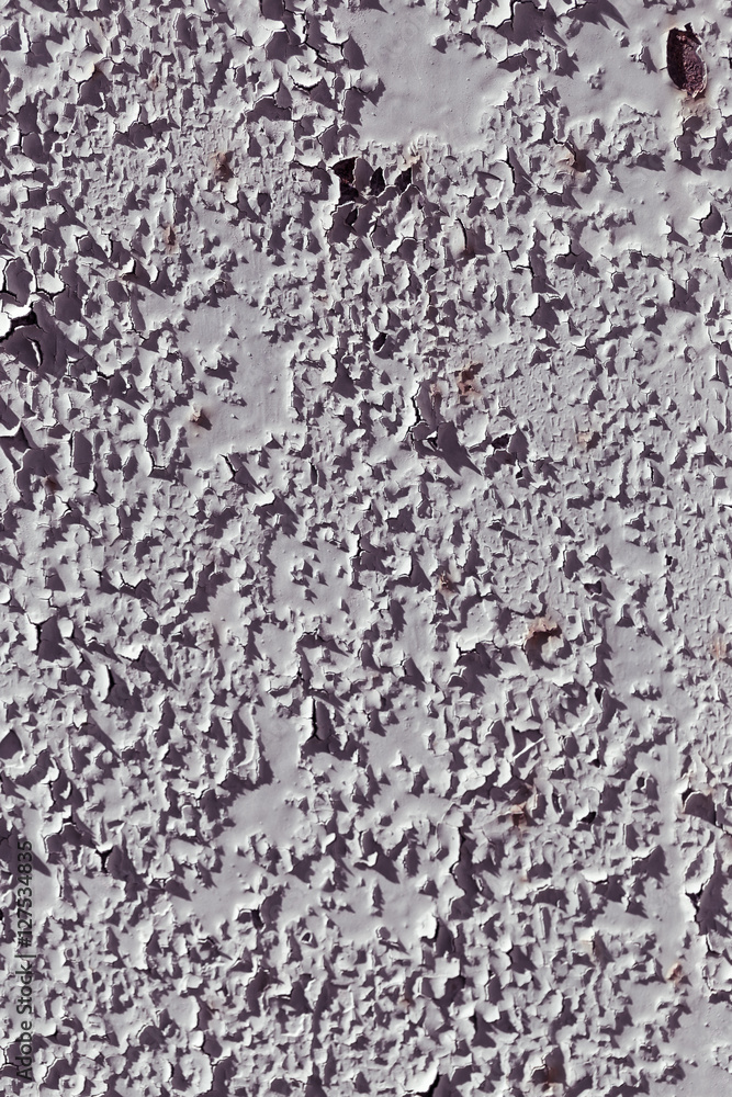 old cracked paint on a wall as a background old cracked paint on a wall as a background