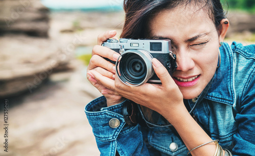  Asia woman taking a photo