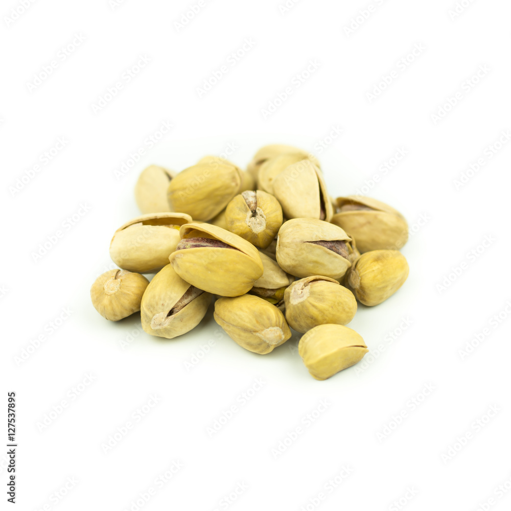 Pistachio nuts. Isolated on a white background. Pistachio nuts. Isolated on a white background.