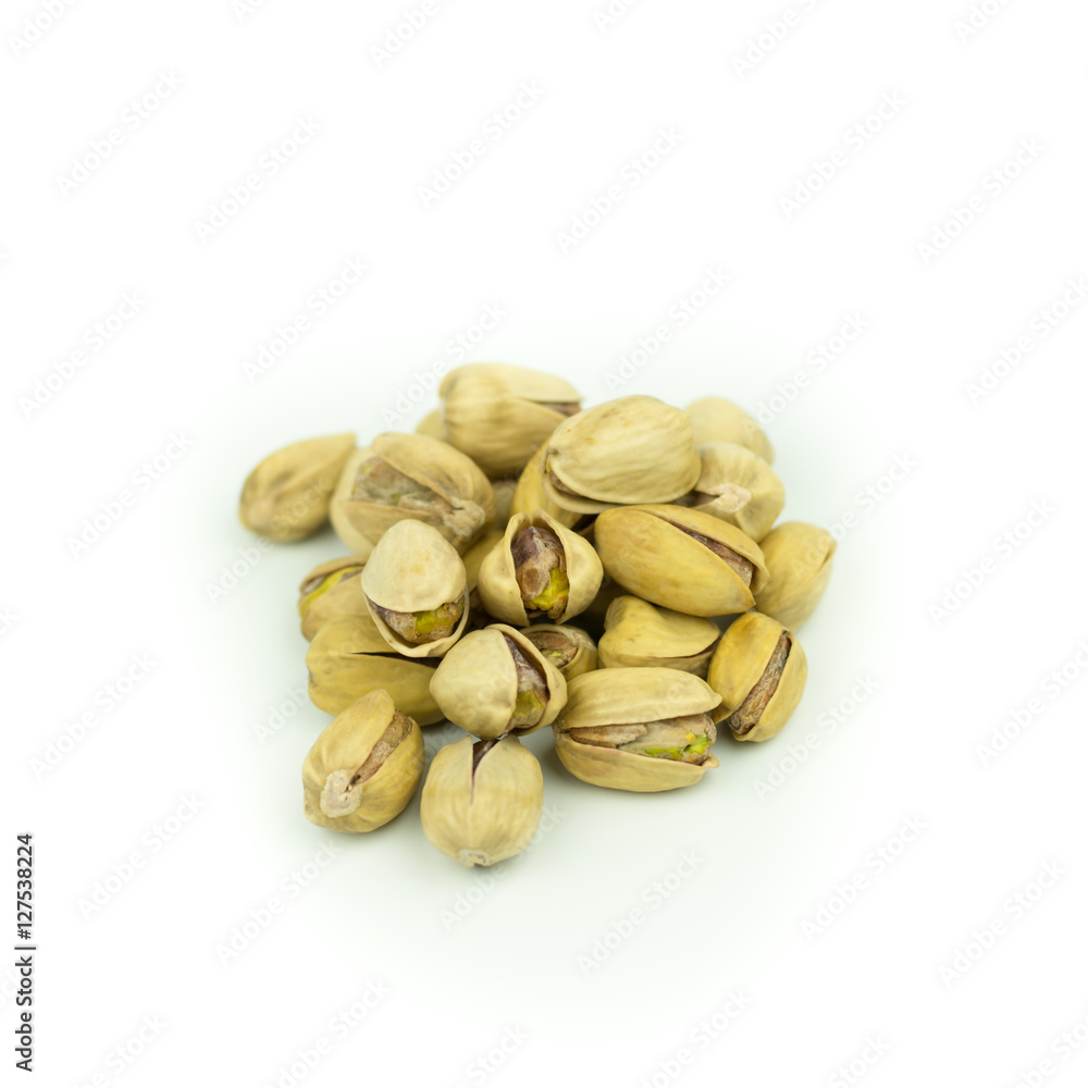 Fototapeta premium Pistachio nuts. Isolated on a white background.