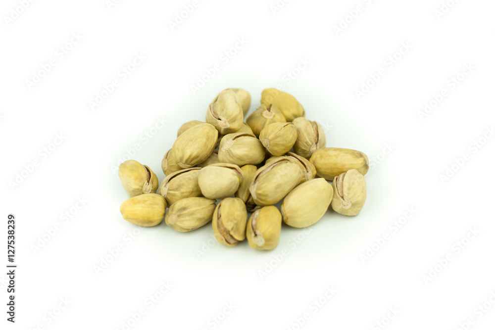 Pistachio nuts. Isolated on a white background. Pistachio nuts. Isolated on a white background.