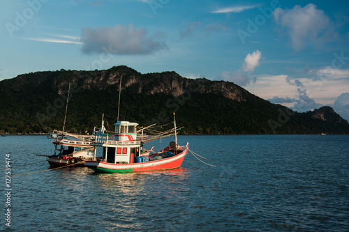 Fishing boat in the sea . Sea evening time background .Fishing boat of Thailand 
