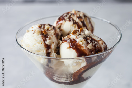 ice cream with chocolate syrup in an ice-cream bowl, selective focus