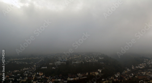 Fototapeta Naklejka Na Ścianę i Meble -  Fog Over City/Thick fog over a European city
