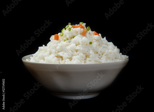 Steamed rice close-up isolated on a black background
