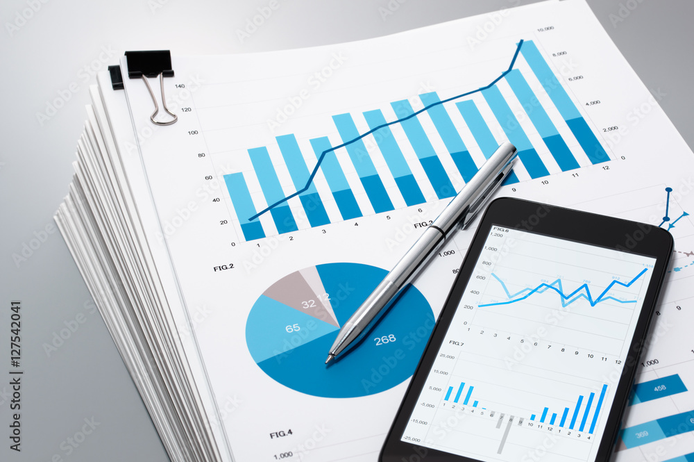 Pile of documents, smartphone and pen. Many graphs and charts. Concept image of data gathering.
Pile of documents, smartphone and pen. Many graphs and charts. Concept image of data gathering.