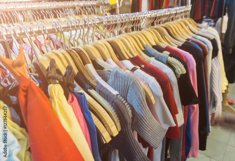 fashion clothing on hangers at the show.. fashion clothing on hangers at the show..